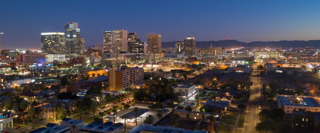 Dusk comes as night falls on the buildings in the downtown urban core of Phoenix Arizona